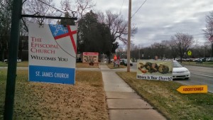 St James wlecome and Abortion Sign